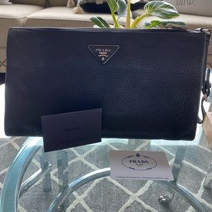 Prada clutch bag.